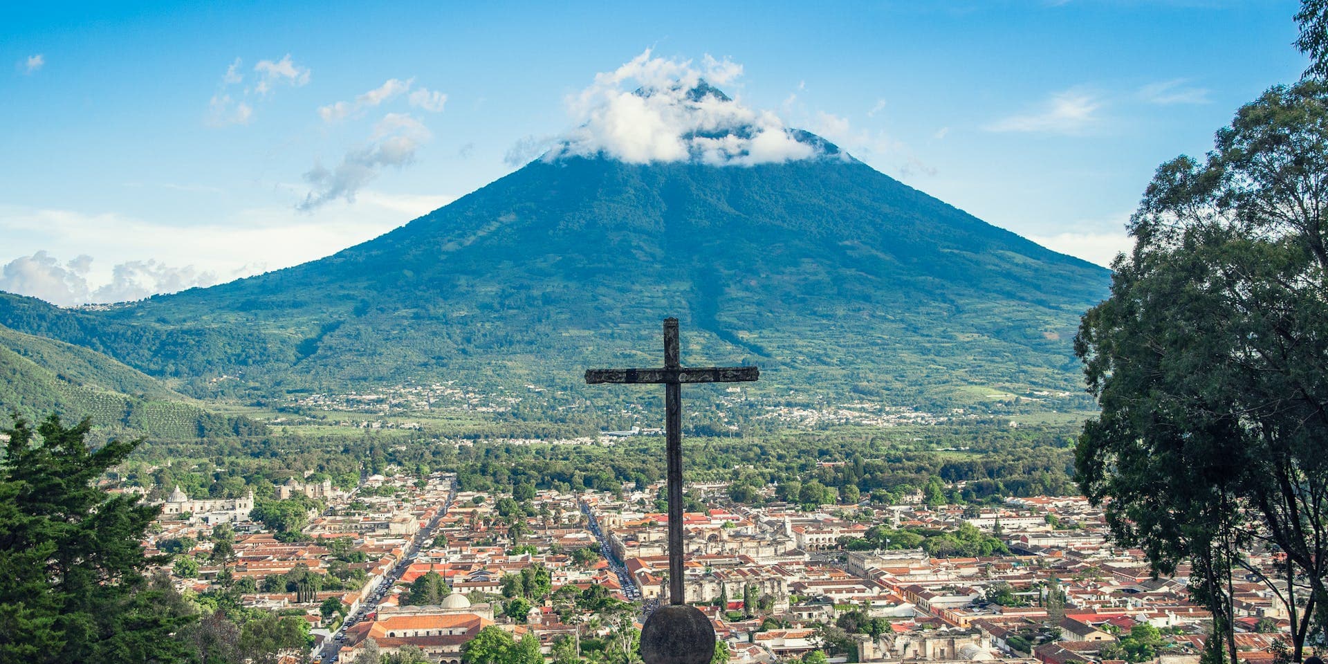 The Cerro de la Cruz cross overlooking Antigua Guatemala and Volcán de Agua
